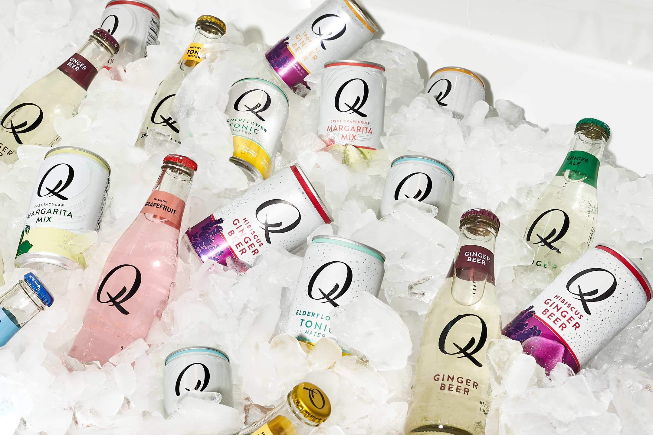 Q Mixers bottles and cans in an ice-filled bathtub.